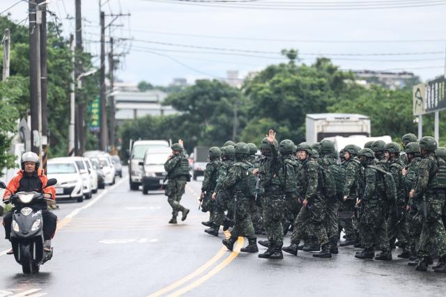 Taiwanese reservists take part in a pre-combat training during Taiwan's annual Han Kuang military exercise in Taoyuan on July 11, 2025. (Photo by I-Hwa Cheng / AFP)