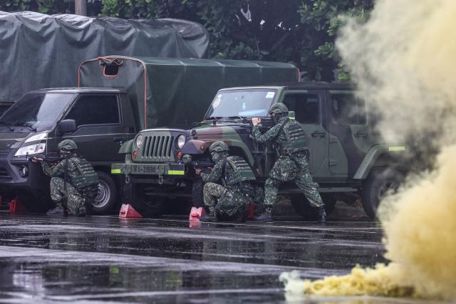 Taiwanese reservists take part in a pre-combat training during Taiwan's annual Han Kuang military exercise in Taoyuan on July 11, 2025. (Photo by I-Hwa Cheng / AFP)