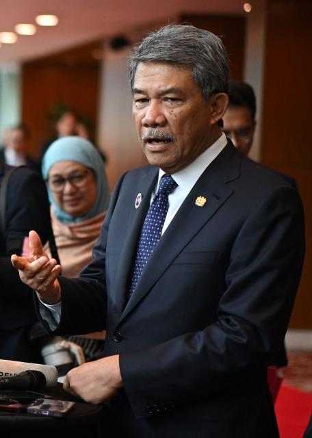 Malaysia's Foreign Affairs Minister Mohamad Hasan takes part in a press briefing during the 58th ASEAN Foreign Ministers' meeting and related meetings at the Convention Centre in Kuala Lumpur on July 11, 2025. (Photo by Mandel NGAN / POOL / AFP)