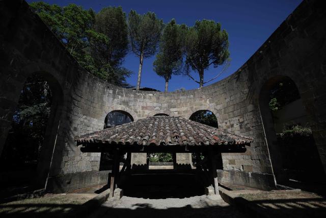 This photograph shows the Ayrolle washhouse in Millau, southern France, on July 10, 2025. (Photo by Valentine CHAPUIS / AFP)