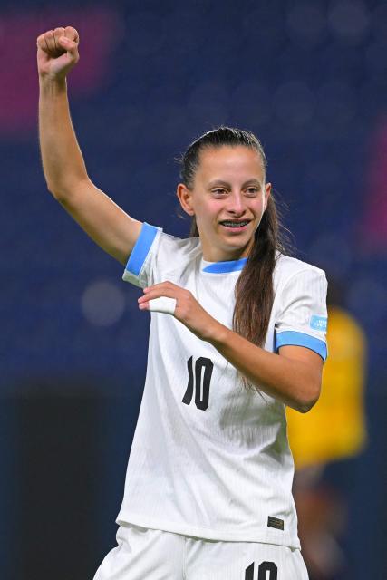 Uruguay's forward #10 Belen Aquino celebrates after scoring during the Women's Copa America 2025 football match between Ecuador and Uruguay at the IDV Stadium in Quito on July 11, 2025. (Photo by Rodrigo BUENDIA / AFP)