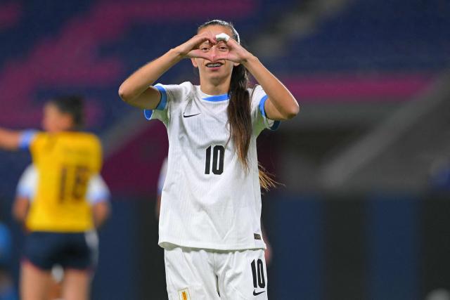 Uruguay's forward #10 Belen Aquino celebrates after scoring during the Women's Copa America 2025 football match between Ecuador and Uruguay at the IDV Stadium in Quito on July 11, 2025. (Photo by Rodrigo BUENDIA / AFP)