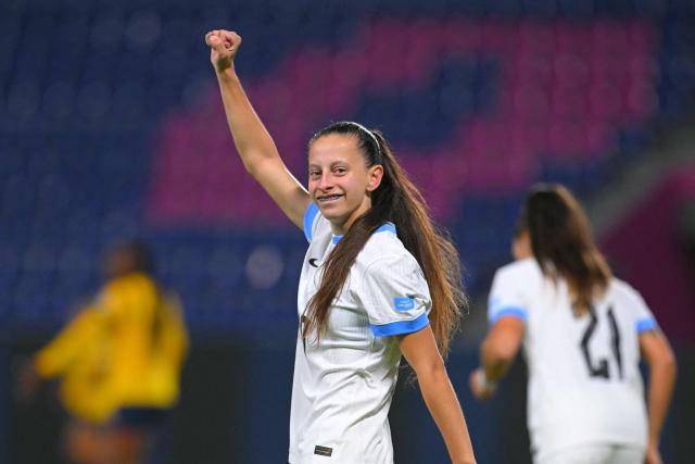 Uruguay's forward #10 Belen Aquino celebrates after scoring during the Women's Copa America 2025 football match between Ecuador and Uruguay at the IDV Stadium in Quito on July 11, 2025. (Photo by Rodrigo BUENDIA / AFP)
