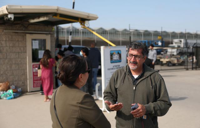 Roman Pinal, National Vice President of United Farm Workers, speaks during an interview outside Glass House Farms in Camarillo, California, on July 11, 2025, the day after an immigration raid on farm workers. A farmworker has died from injuries sustained during an immigration raid on legal cannabis farms near Los Angeles, where clashes erupted between federal agents and protesters. The man was injured on July 10 and died the following day, July 11.
"The family informed me that he was in intensive care, and this morning they confirmed that he had passed away," Roman Pinal, vice-president of United Farm Workers, told AFP at the scene.
The raid occurred July 10 in Carpinteria and Camarillo, two agricultural communities in Ventura County, about an hour northwest of Los Angeles. (Photo by Patrick T. Fallon / AFP)