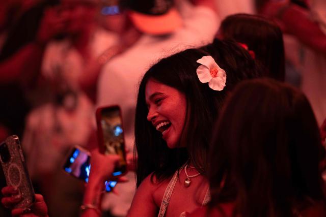 Fans attend the first show of Puerto Rican singer Bad Bunny's 30-date concert residency at the Coliseo de Puerto Rico in San Juan, Puerto Rico, on July 11, 2025. (Photo by Ricardo ARDUENGO / AFP)