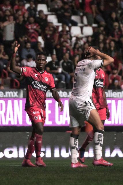 Tijuana's Ecuadorian midfielder #11 Adonis Preciado (L) celebrates after scoring against Queretaro during the Liga MX Clausura football tournament match between Tijuana and Queretaro at Caliente Stadium in Tijuana, Baja California State, Mexico, on July 11, 2025. (Photo by Guillermo Arias / AFP)