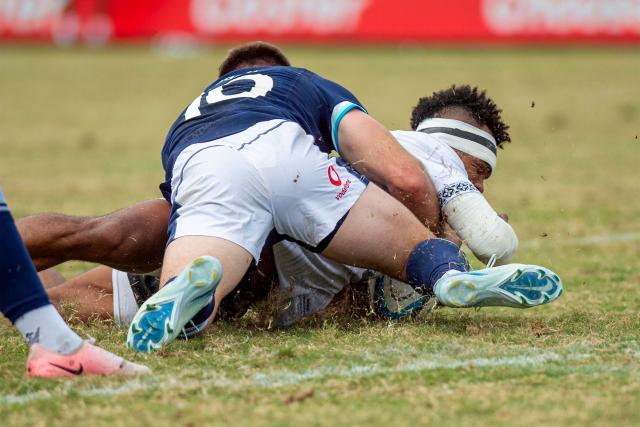 Scotland's Fergus Burke tackles Fiji's Sireli Maqala during the rugby test match between Fiji and Scotland at HFC Bank Stadium in Suva on July 12, 2025. (Photo by Josua BUREDUA / AFP)