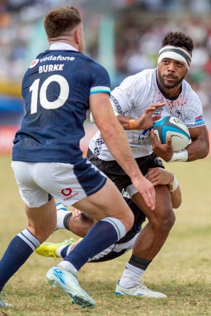 Scotland's Fergus Burke (L) challenges Fiji's Sireli Maqala during the rugby test match between Fiji and Scotland at HFC Bank Stadium in Suva on July 12, 2025. (Photo by Josua BUREDUA / AFP)