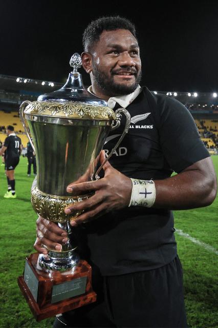New Zealand's Timoci Tavatavanawai holds the Dave Gallaher Trophy for the series win during the second international rugby test match between New Zealand and France at Sky Stadium in Wellington on July 12, 2025. (Photo by Grant Down / AFP)
