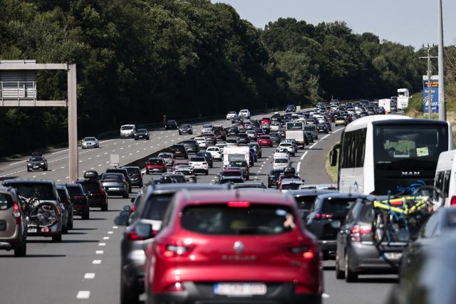 This photograph shows vehicles in traffic near Saint-Arnoult-en-Yveline on the A10 highway, south of Paris, on July 12, 2025. (Photo by Thibaud MORITZ / AFP)