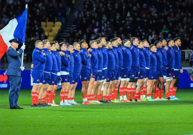 French players sing their national anthem prior to their second international rugby test match between New Zealand and France at Sky Stadium in Wellington on July 12, 2025. (Photo by Grant Down / AFP)