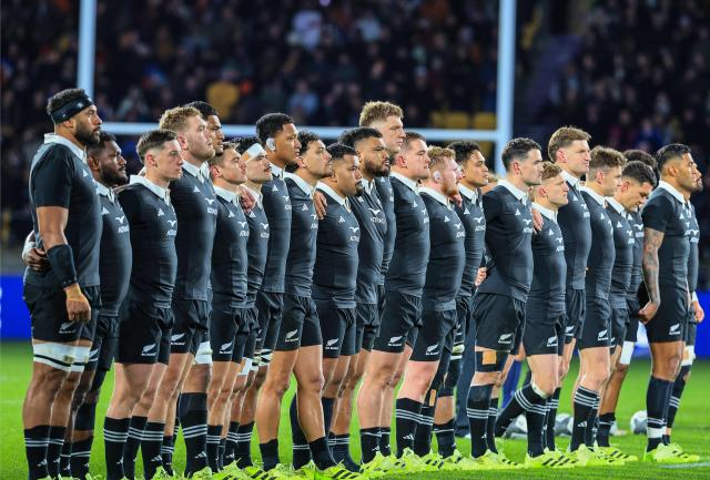 New Zealand All Black players listen to the national anthems prior to their second international rugby test match between New Zealand and France at Sky Stadium in Wellington on July 12, 2025. (Photo by Grant Down / AFP)