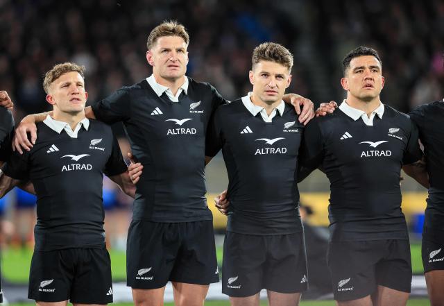 (L to R) New Zealand's Damian McKenzie, Jordie Barrett, Beauden Barrett and Codie Taylor sing the national anthems prior to their second international rugby test match between New Zealand and France at Sky Stadium in Wellington on July 12, 2025. (Photo by Grant Down / AFP)
