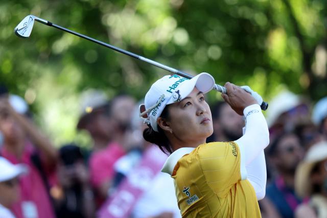 Autsralia's Minjee Lee looks on after a shot during the third round of the Amundi Evian Championship at Evian Resort Golf Club, in Evian-Les-Bains, eastern France, on July 12, 2025. (Photo by Alex MARTIN / AFP)