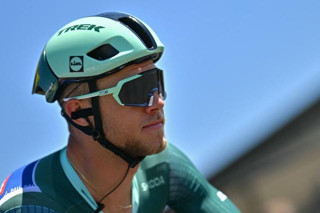 Lidl - Trek team's Italian rider Jonathan Milan wearing the best sprinter's green jersey awaits the start of the 8th stage of the 112th edition of the Tour de France cycling race, 171.4 km between Saint-Meen-le-Grand and Laval Espace Mayenne, western France, on July 12, 2025. (Photo by Loic VENANCE / AFP)