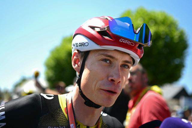 Team Visma - Lease a bike team's Danish rider Jonas Vingegaard awaits the start of the 8th stage of the 112th edition of the Tour de France cycling race, 171.4 km between Saint-Meen-le-Grand and Laval Espace Mayenne, western France, on July 12, 2025. (Photo by Loic VENANCE / AFP)