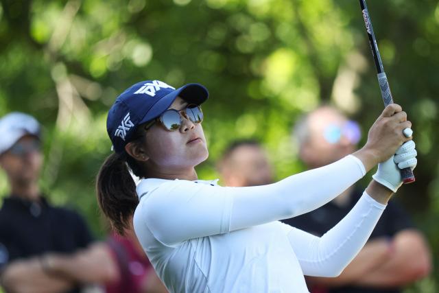 US' Auston Kim looks on after a shot during the third round of the Amundi Evian Championship at Evian Resort Golf Club, in Evian-Les-Bains, eastern France, on July 12, 2025. (Photo by Alex MARTIN / AFP)