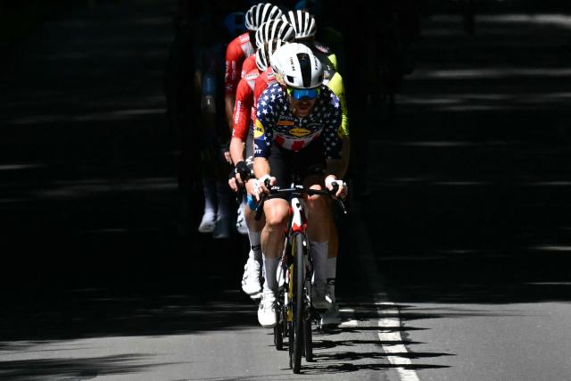 Lidl - Trek team's US rider Quinn Simmons leads the pack of riders (peloton) during the 8th stage of the 112th edition of the Tour de France cycling race, 171.4 km between Saint-Meen-le-Grand and Laval Espace Mayenne, western France, on July 12, 2025. (Photo by Loic VENANCE / AFP)