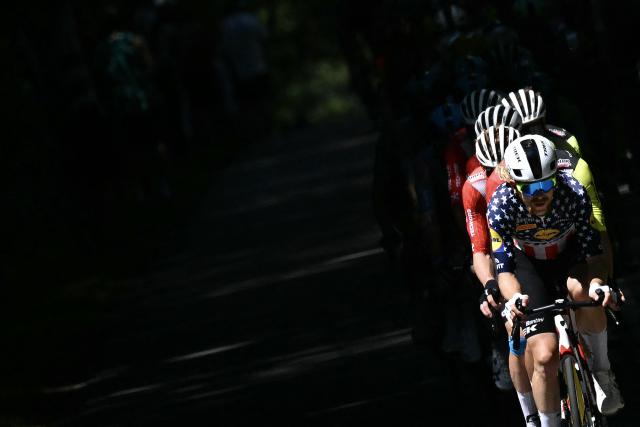 TOPSHOT - Lidl - Trek team's US rider Quinn Simmons leads the pack of riders (peloton) during the 8th stage of the 112th edition of the Tour de France cycling race, 171.4 km between Saint-Meen-le-Grand and Laval Espace Mayenne, western France, on July 12, 2025. (Photo by Loic VENANCE / AFP)