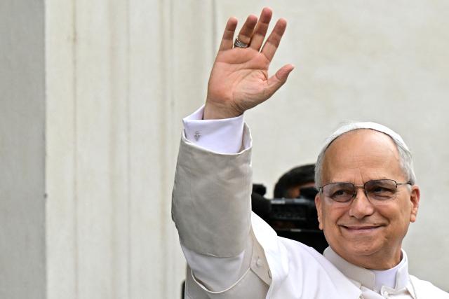 Pope Leone XIV arrives to preside over a mass in the Parrocchia Pontificia di San Tommaso da Villanova (Papal Parish of St. Thomas of Villanova) in the summer papal estate in Castel Gandolfo, 40 km southeast of Rome, on July 13, 2025. The newly elected Pope Leo XIV, takes a summer break from July 6 to 20 at the papal palace at Castel Gandolfo, outside Rome, a longtime country residence for pontiffs that Francis declined to use. (Photo by Tiziana FABI / POOL / AFP)