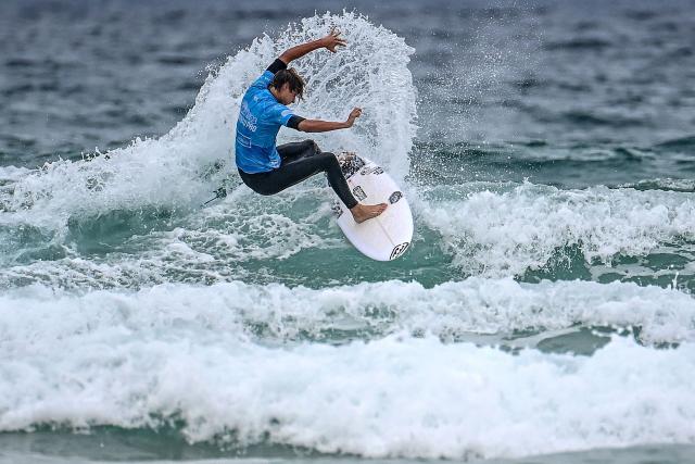 France's surfer Sam Piter rides a wave during the final of the Lacanau Pro World Surf League (WSL) event along the Atlantic Ocean in Lacanau, south-western France on July 13, 2025. For nearly fifty years, the Lacanau Pro has withstood all the upheavals in the surf industry to become the last major international gathering in mainland France. (Photo by Christophe ARCHAMBAULT / AFP)