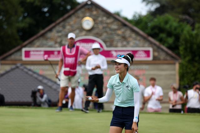 Australia's Grace Kim reacts as she competes during the final round of the Amundi Evian Championship at Evian Resort Golf Club, in Evian-Les-Bains, eastern France on July 13, 2025. (Photo by Alex MARTIN / AFP)
