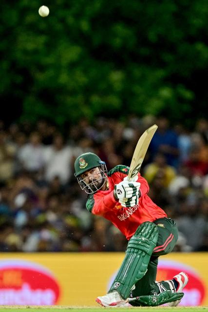 Bangladesh's captain Litton Das plays a shot during the second Twenty20 international cricket match between Sri Lanka and Bangladesh at the Rangiri Dambulla International Stadium in Dambulla on July 13, 2025. (Photo by Ishara S. KODIKARA / AFP)
