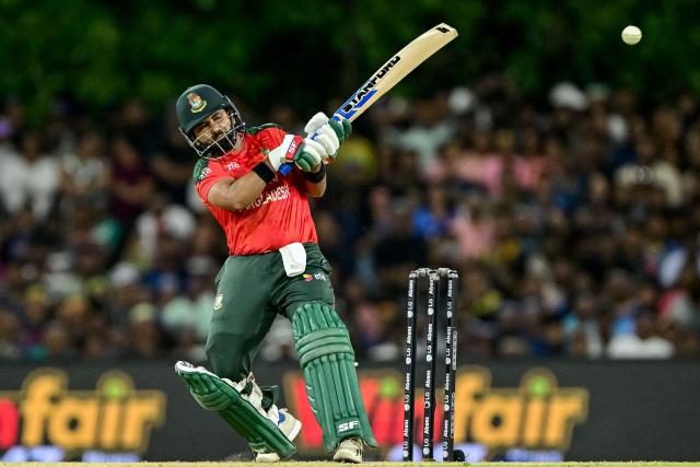 Bangladesh's Shamim Hossain plays a shot during the second Twenty20 international cricket match between Sri Lanka and Bangladesh at the Rangiri Dambulla International Stadium in Dambulla on July 13, 2025. (Photo by Ishara S. KODIKARA / AFP)