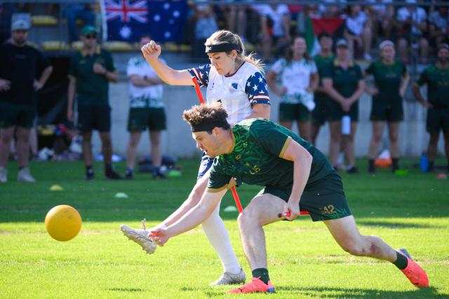 Players take part in a quidditch match between US and Australia, a sport inspired by the "Harry Potter"serie books, during a Quadball World Cup 2025, in Tubize, on July 13, 2025. (Photo by JOHN THYS / AFP)