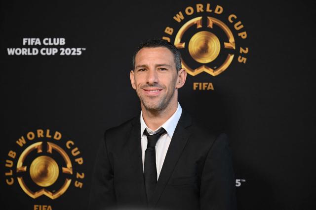 Argentinian former footyball player Maxi Rodriguez poses on the Golden Carpet upon arrival for the FIFA Club World Cup 2025 final football match between England's Chelsea and France's Paris Saint-Germain at the MetLife Stadium in East Rutherford, New Jersey on July 13, 2025. (Photo by ANGELA WEISS / AFP)