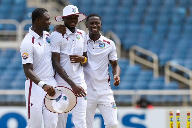 (L/R) Jayden Seales, Alzarri Joseph and Shamar Joseph of West Indies celebrate bowling out Australia during the third day of the third Test cricket match between West Indies and Australia at Sabina Park in Kingston, Jamaica, on July 14, 2025. (Photo by Randy Brooks / AFP)