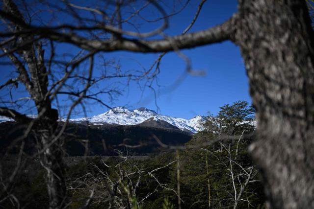 View of the volcanoes Chillan Viejo and Chillan Nuevo, from the town of Las Trancas in the Ñuble region, Chile, on July 9, 2025. (Photo by RODRIGO ARANGUA / AFP)