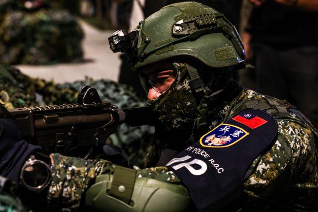 A soldier takes part in Taiwan's annual Han Kuang military exercises in Taipei on July 15, 2025. (Photo by I-Hwa Cheng / AFP)
