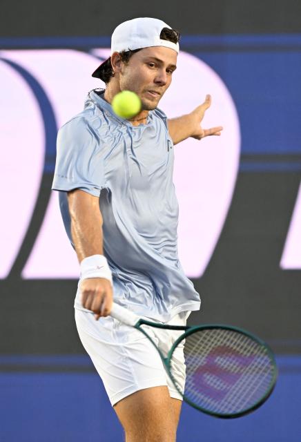 US' Aleksandar Kovacevic returns to Lebanon's Hady Habib during their Mexico ATP Open men's singles tennis match at the Cabo Sports Complex in Los Cabos, Baja California, Mexico on July 14, 2025. (Photo by Alfredo ESTRELLA / AFP)