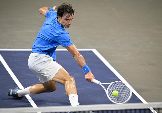 Russia's Alibek Kachmazov returns to Argentina's Juan Pablo Ficovich during their Mexico ATP Open men's singles tennis match at the Cabo Sports Complex in Los Cabos, Baja California, Mexico on July 14, 2025. (Photo by Alfredo ESTRELLA / AFP)
