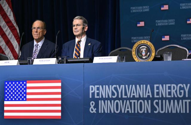 CEO of BlackRock Larry Fink (L) and US Secretary of Treasury Scott Bessent attend the Pennsylvania Energy and Innovation Summit on the campus of Carnegie Mellon University in Pittsburgh, Pennsylvania on July 15, 2025. (Photo by ANDREW CABALLERO-REYNOLDS / AFP)