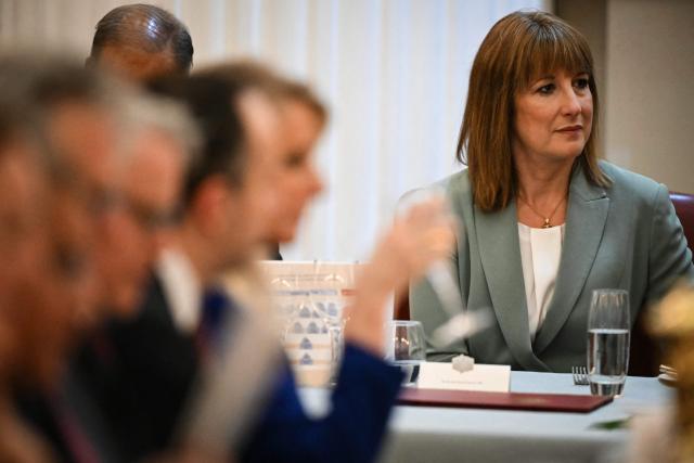 Britain's Chancellor of the Exchequer Rachel Reeves reacts during the speech of the Lord Mayor of the City of London as she attends the Financial and Professional Services Dinner, hosted by the Lord Mayor of the City London, at Mansion House, in the City of London, on July 15, 2025. (Photo by JUSTIN TALLIS / AFP)