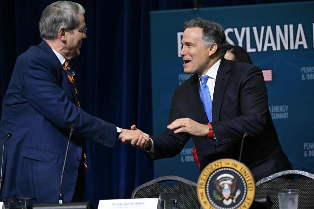 US Treasury Secretary Scott Bessent (L) shakes hands with US Republican Senator of Pennsylvania Dave McCormick at the inaugural Pennsylvania Energy and Innovation Summit on the campus of Carnegie Mellon University in Pittsburgh, Pennsylvania, on July 15, 2025. (Photo by ANDREW CABALLERO-REYNOLDS / AFP)