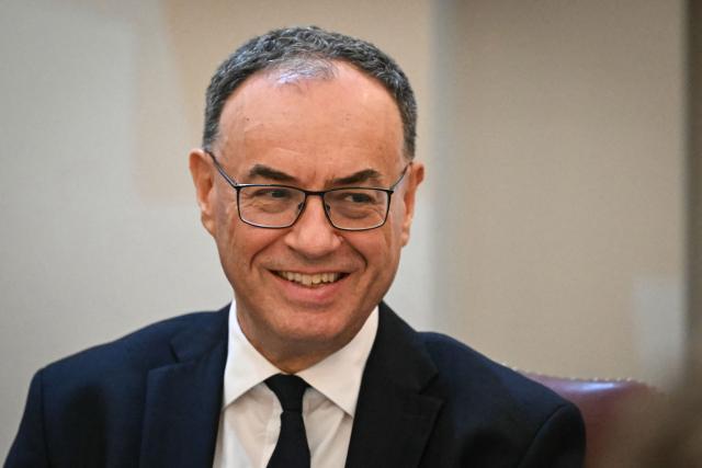 Bank of England Governor Andrew Bailey reacts during the speech of the Lord Mayor of the City of London as she attends the Financial and Professional Services Dinner, hosted by the Lord Mayor of the City London, at Mansion House, in the City of London, on July 15, 2025. (Photo by JUSTIN TALLIS / AFP)