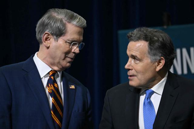 US Treasury Secretary Scott Bessent (L) speaks with US Republican Senator of Pennsylvania Dave McCormick at the inaugural Pennsylvania Energy and Innovation Summit on the campus of Carnegie Mellon University in Pittsburgh, Pennsylvania, on July 15, 2025. (Photo by ANDREW CABALLERO-REYNOLDS / AFP)