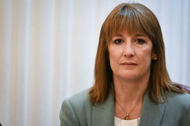Britain's Chancellor of the Exchequer Rachel Reeves reacts during the speech of the Lord Mayor of the City of London as she attends the Financial and Professional Services Dinner, hosted by the Lord Mayor of the City London, at Mansion House, in the City of London, on July 15, 2025. (Photo by JUSTIN TALLIS / AFP)