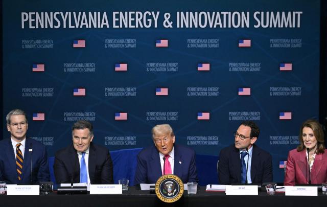 (L/R) US Secretary of Treasury Scott Bessent, US Senator Dave McCormick (R-PA), US President Donald Trump, CEO of Blackstone Group Jon Gray and President and chief investment officer of Google Ruth Porat attend the Pennsylvania Energy and Innovation Summit on the campus of Carnegie Mellon University in Pittsburgh, Pennsylvania on July 15, 2025. (Photo by ANDREW CABALLERO-REYNOLDS / AFP)
