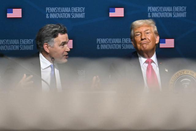 US President Donald Trump (R) and US Senator Dave McCormick (R-PA) attend the Pennsylvania Energy and Innovation Summit on the campus of Carnegie Mellon University in Pittsburgh, Pennsylvania on July 15, 2025. (Photo by ANDREW CABALLERO-REYNOLDS / AFP)