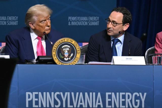 US President Donald Trump (L) and CEO of Blackstone Group Jon Gray attend the Pennsylvania Energy and Innovation Summit on the campus of Carnegie Mellon University in Pittsburgh, Pennsylvania on July 15, 2025. (Photo by ANDREW CABALLERO-REYNOLDS / AFP)