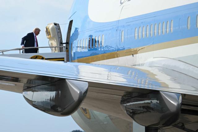 US President Donald Trump boards Air Force One at Pittsburgh International Airport in Pittsburgh, Pennsylvnia, on July 15, 2025, en route to the White House. Trump was in Pittsburgh, Pennsylvania, to speak at the Pennsylvania Energy and Innovation Summit on the campus of Carnegie Mellon University. (Photo by ANDREW CABALLERO-REYNOLDS / AFP)