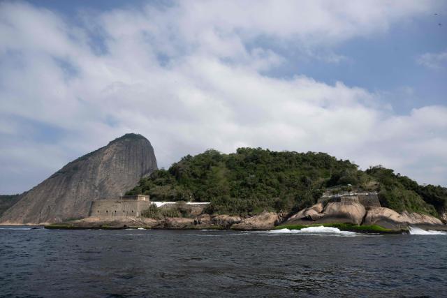 View of Sugar Loaf taken from the Guanabara Bay in Rio de Janeiro, Brazil on July 15, 2025. (Photo by Pablo PORCIUNCULA / AFP)