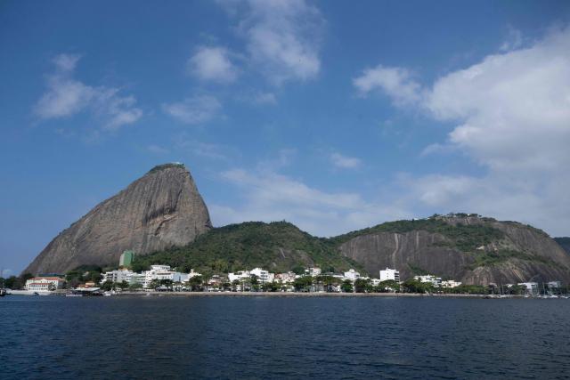 View of Sugar Loaf taken from the Guanabara Bay in Rio de Janeiro, Brazil on July 15, 2025. (Photo by Pablo PORCIUNCULA / AFP)