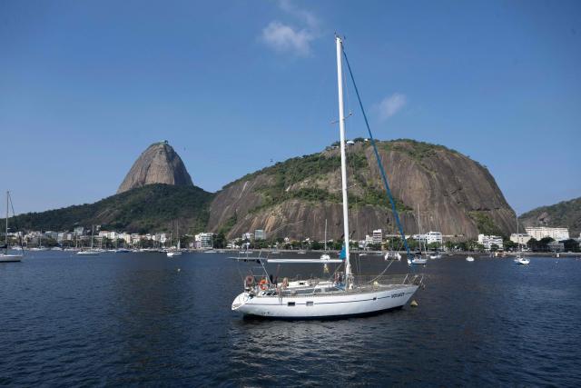 View of Sugar Loaf taken from the Guanabara Bay in Rio de Janeiro, Brazil on July 15, 2025. (Photo by Pablo PORCIUNCULA / AFP)