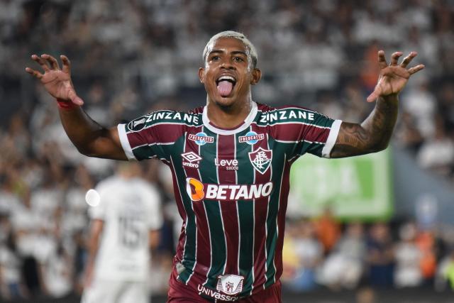 (FILES) Fluminense's forward John Kennedy celebrates after scoring during the Copa Libertadores quarterfinals second leg football match between Paraguay's Olimpia and Brazil's Fluminense at the Defensores del Chaco stadium in Asuncion, on August 31, 2023. The hero of Fluminense's Copa Libertadores triumph in 2023, striker John Kennedy is returning to the Rio de Janeiro club, the club announced on July 15, 2025. (Photo by DANIEL DUARTE / AFP)