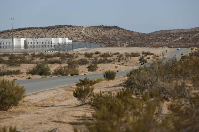 The CoreCivic, Inc. California City Immigration Processing Center stands in the Kern County desert awaiting reopening as a federal immigrant detention facility under contract with the US Immigration and Customs Enforcement (ICE) in California City, California on July 10, 2025. (Photo by Patrick T. Fallon / AFP)